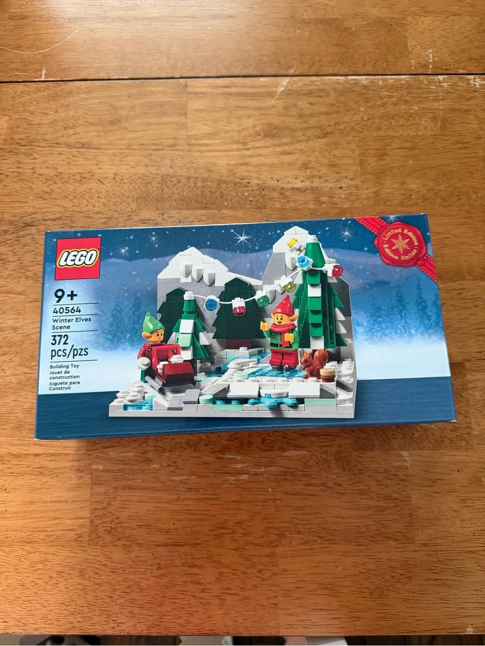 LEGO Winter Elves Scene with Red Sled and Green Trees